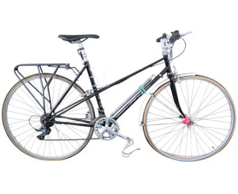A late 20th century Raleigh "Reynolds 531" bicycle with origin frame and forks, size from centre crank to seat tube approxima