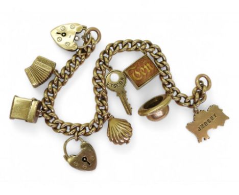 A 9ct gold charm bracelet with heart shaped clasp,with eight 9ct gold charms to include a bowler hat, 10 'Bob' note and conce