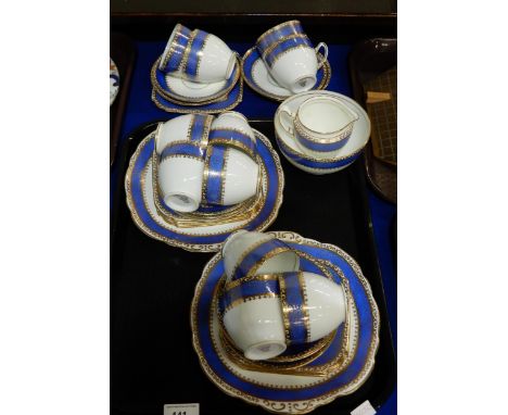 A Kent China tea set with gilt wriggle work on blue band Condition Report:Available upon request