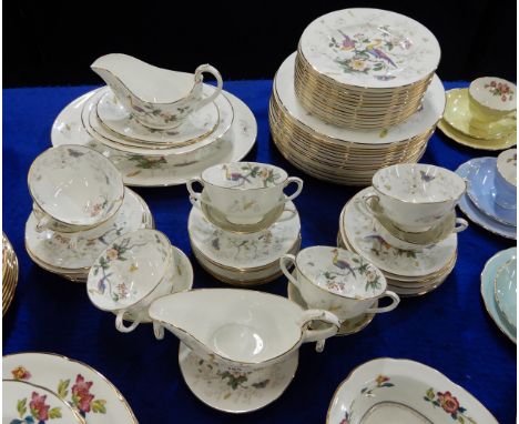 A Coalport Paradise pattern dinner service, comprising dinner plates, medium plates, soup coupes and saucers, side plates, gr