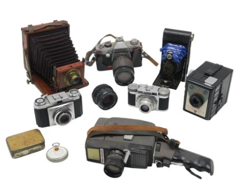 Camera equipment, comprising a mahogany and brass J. Lizars "Challenge" folding plate camera, a Praktica L film camera fitted