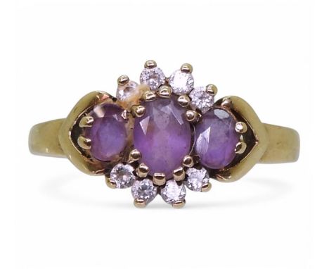A 9ct gold amethyst and cubic zirconia cluster ring, size Q1/2, weight 2.3gms Condition Report:Available upon request