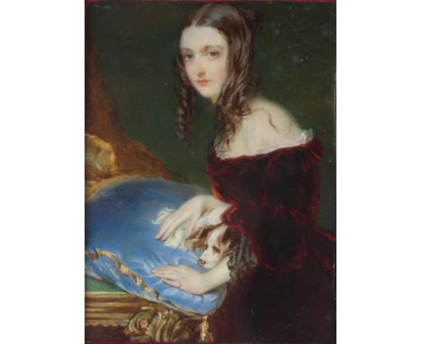 ENGLISH SCHOOL EARLY 19TH CENTURY &nbsp;PORTRAIT OF AN ELEGANT YOUNG WOMAN IN RINGLETS, WITH SPANIEL ON SATIN CUSHION &nbsp;O
