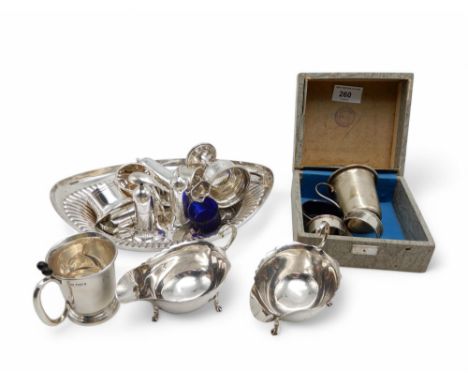 A silver christening mug, by Emile Viner, Birmingham 1955, two silver coffee spoons, Birmingham 1935, a cup marked Sterlig Pe