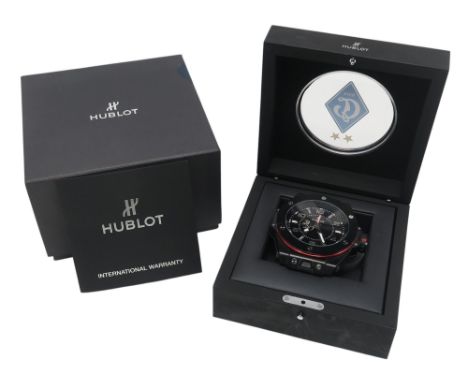 A Hublot Big Bang Ferrari desk clock, housed in a display case within outer box, retaining warranty card, numbered DC. 02. ND