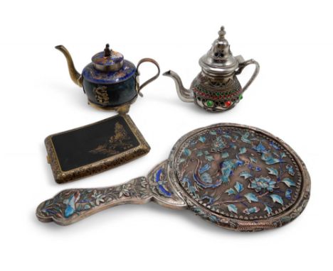 A Chinese silver enamel mirror, decorated in tones of blue and purple with phoenix and flowers, a Japanese niello cigarette c