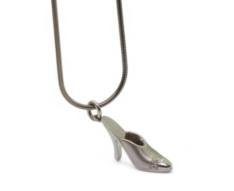 An 18k white gold 46cm snake chain, with a diamond set high heeled shoe pendant, weight 16.5gms Condition Report:Available up