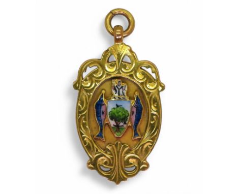 A 9ct gold and enamel medallion with the Glasgow Coat Of Arms for G.J.F.L Runner Up 1926-7 Strathclyde F.C Awarded to J.M McA