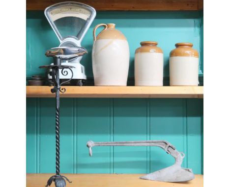 A mixed lot to include set of shops scales with three assorted weights, three stoneware containers, wrought iron freestanding
