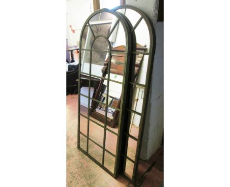 GARDEN MIRRORS, a pair, Architectural style verdigris metal with an arched top, 66cm W x 159cm H. (2)