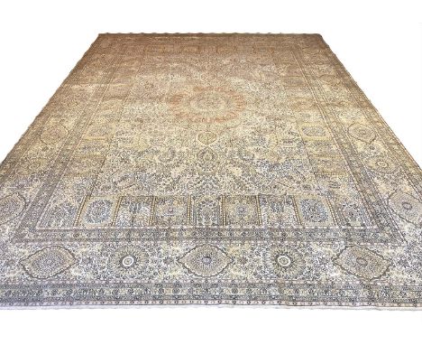 EXTREMELY FINE PURE SILK TURKISH HEREKE DESIGN CARPET, 420cm x 312cm, central medallion on an ivory field of scrolling vines 