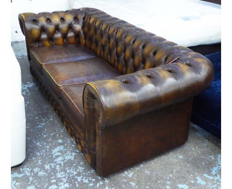 CHESTERFIELD SOFA, in antiqued buttoned leather finish, 86cm D x 72cm H x 205cm W.