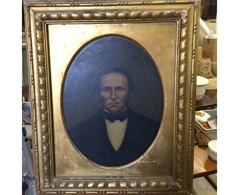 A framed oil portrait in gilt frame.
