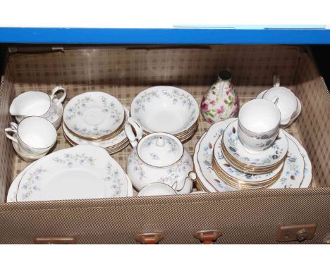 Vintage luggage case including part tea wares.