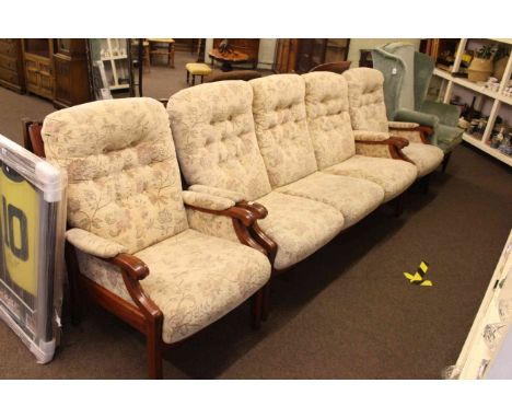 Parker Knoll three piece lounge suite in light buttoned floral fabric.