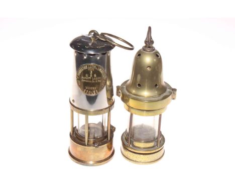 Two miners lamps, Protector type 6 and other hanging lamp.