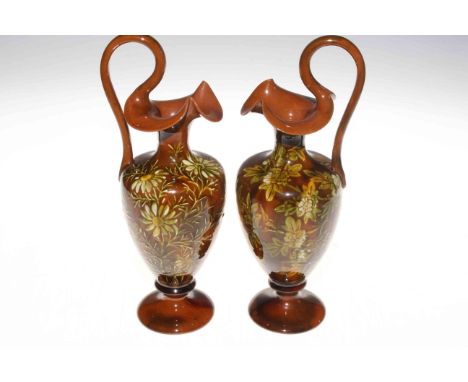 Pair Linthorpe Pottery ewers, shape no. 1936, 29cm.