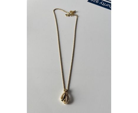 A vintage Christian Dior Germany gold plated necklace &amp; pendant, together with various costume brooches and clip-on earri