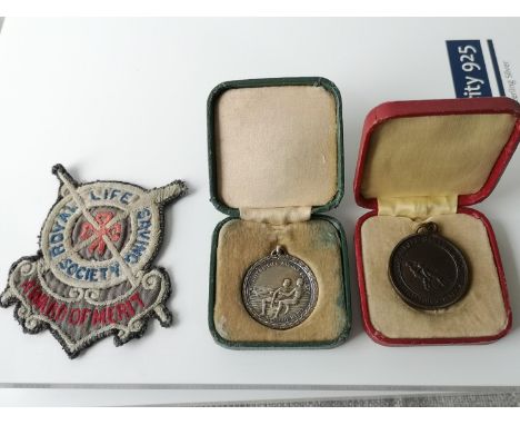 A Vintage Royal Life Saving Society patch &amp; two medals. one of which is Birmingham silver &amp; the other copper/ bronze.