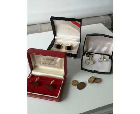 A Pair of vintage 9ct gold cufflinks with original box produced by H. Samuel. [7.48grams] a pair of Kickok gilt &amp; onyx cu