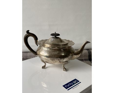 A Birmingham silver teapot supported on claw &amp; ball feet, engraved to the side showing a dragon insignia [dated, 1904] [5