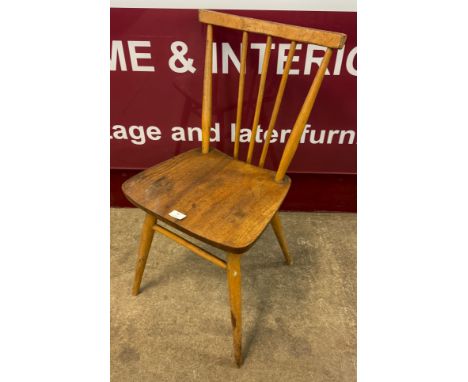 An Ercol Blonde elm and beech 391 model chair 