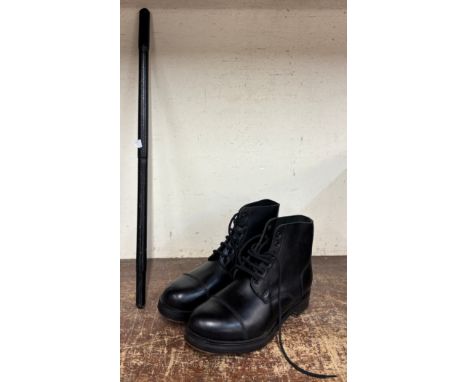 A pair of leather parade boots and a swagger stick 