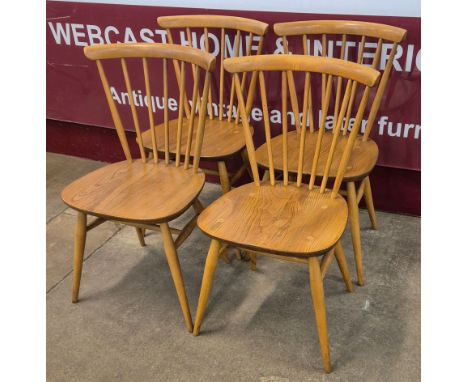 A set of four Ercol Blonde elm and beech 449 model chairs 