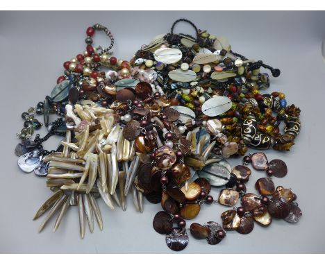 Assorted necklaces including mother of pearl, glass, etc. 