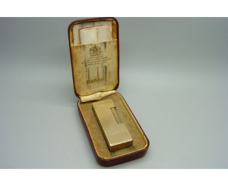 A 9ct gold Dunhill lighter, with case 