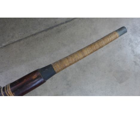 A Far Eastern sword with wooden scabbard 