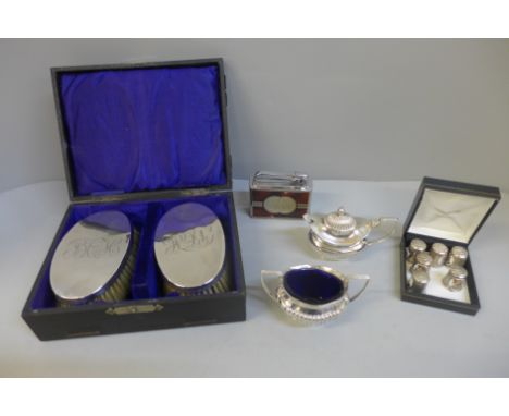 A silver brush set, boxed, Colibri lighter, six Hummel thimbles and two plates condiments 