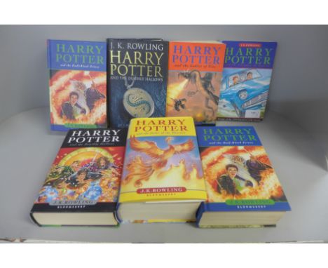 Five first edition Harry Potter books and two paperback books 