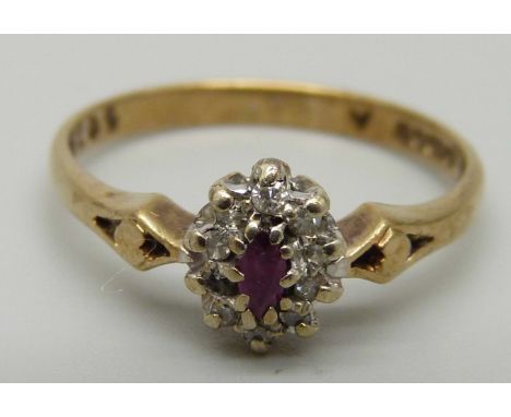 A 9ct gold, ruby and diamond cluster ring, 1.8g, O 