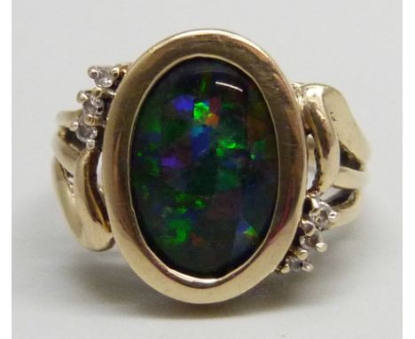 A 9ct gold ring with mosaic opal style inlay and six diamonds, 3.8g, N 