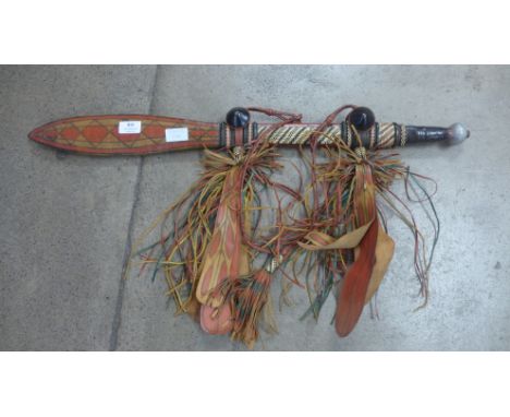 A sword with decorative leather scabbard 