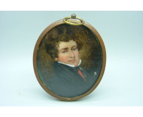 A Georgian oval portrait miniature on card, framed 