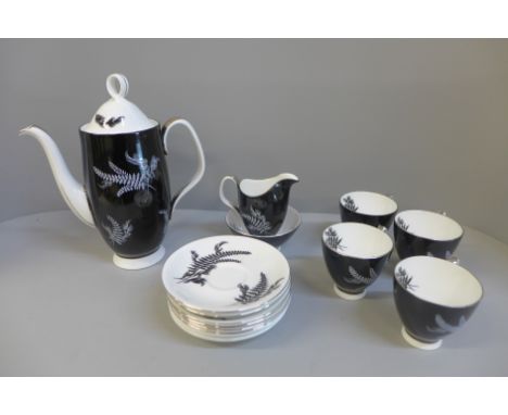 Royal Albert Night and Day part coffee set, four cups, six saucers, a coffee pot with cream and sugar and three black saucers