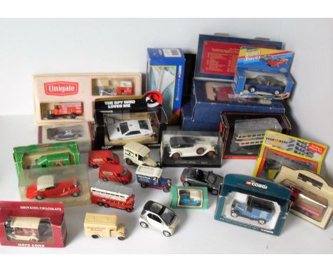 A selection of 24 Corgi, Lledo, Days Gone, Solido, to include 007 The Spy Who Loved Me, Queen Mothers Century Tram 36712 (x2)