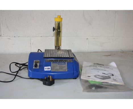 A DRAPER 12' FS12 HOBBY FRETSAW with manual and some spares (PAT pass an working)