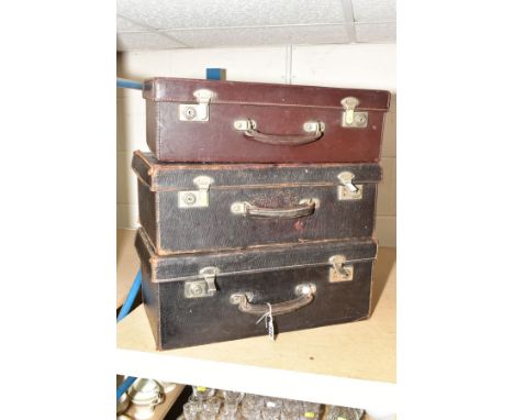 THREE VINTAGE LEATHER COVERED MEDICAL CASES WITH DRAWERS FITTED TO THE INTERIORS, the lid interiors with expanding pocket, tw