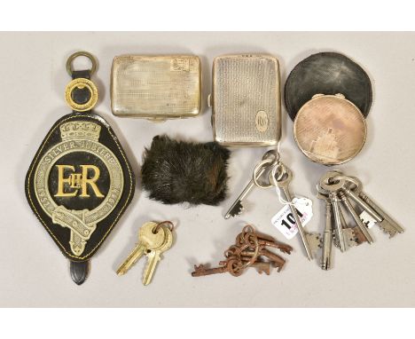 A SMALL COLLECTION OF SILVER KEYS, etc, including two George V rectangular silver cigarette cases, both with engine turned de