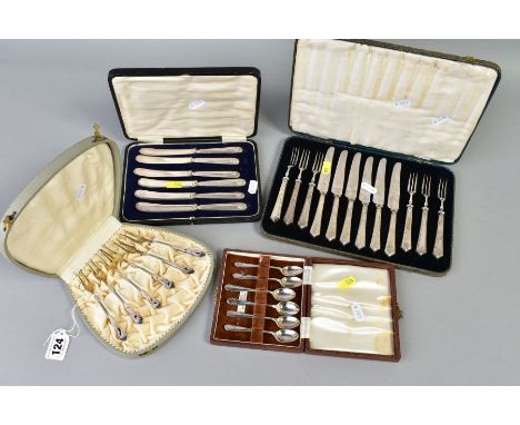 A CASED SET OF SIX STERLING SILVER GILT AND ENAMEL CAKE FORKS, decorated with pink/blue enamel and silhouettes of birds, s.d 