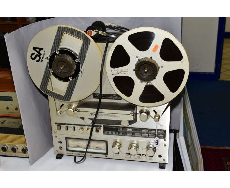 A TEAC X1000R REEL TO REEL PLAYER, with dual capstan drive, Bi directional record/Tension Servo, DBX noise reduction and two 