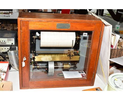 A WATER FLOW METER by The Lea Recorder Co Ltd, of Manchester, serial no 9253/57, contained in original glass fronted wooden c