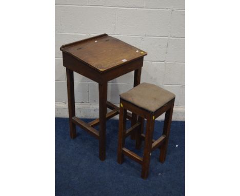 AN EARLY TO MID 20TH CENTURY STAINED PINE SCHOOL DESK together with a high stool (2)