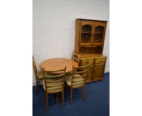 A MODERN PINE CIRCULAR PEDESTAL KITCHEN TABLE, diameter 90cm x height 77cm, four beech ladder back chairs, together with a pi