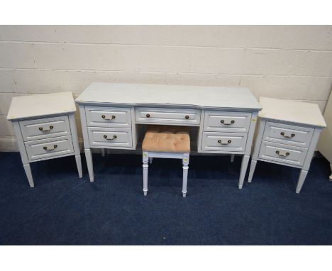 A MODERN OLYMPUS FURNITURE WHITE DRESSING TABLE with five drawers, width 136cm x depth 47cm x height 76cm, a pair of matching