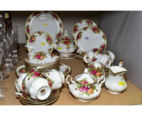 A QUANTITY OF ROYAL ALBERT OLD COUNTRY ROSES TEA AND DINNERWARES, mostly seconds, tea plates and some cups are firsts, includ