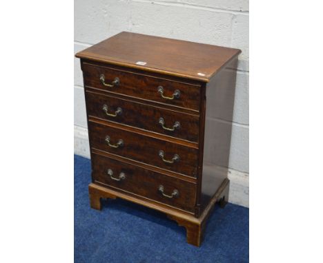 A SMALL SOLID MAHOGANY CHEST OF FOUR LONG DRAWERS on bracket feet, width 52cm x depth 32cm x height 71cm